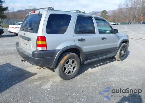 2004 Ford Escape Xlt z USA, uszkodzony, nr VIN 1FMCU03164KA96034